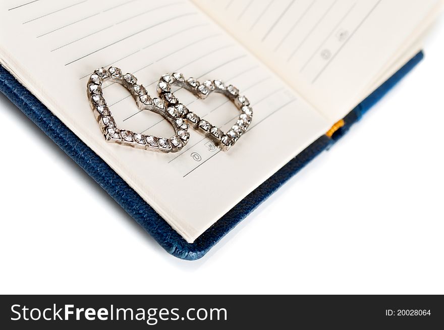 Heart on a notebook page isolated on a white background