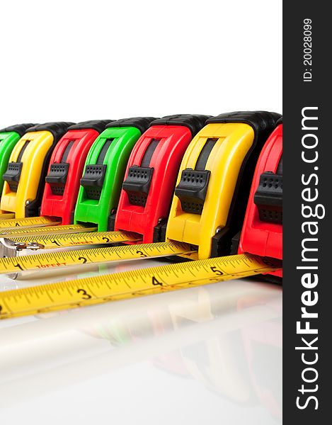 Many tape measure isolated on a white background