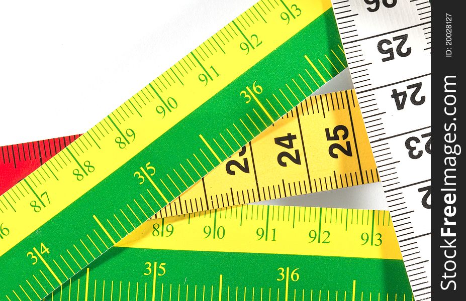 Measuring tape on the white background