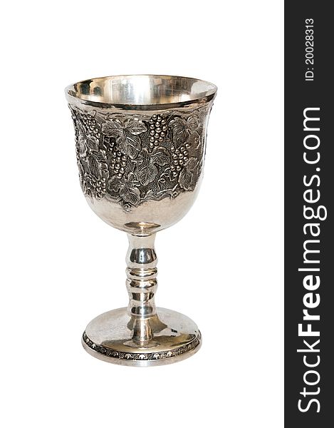 Old-time silver cup by inlaid grapevine