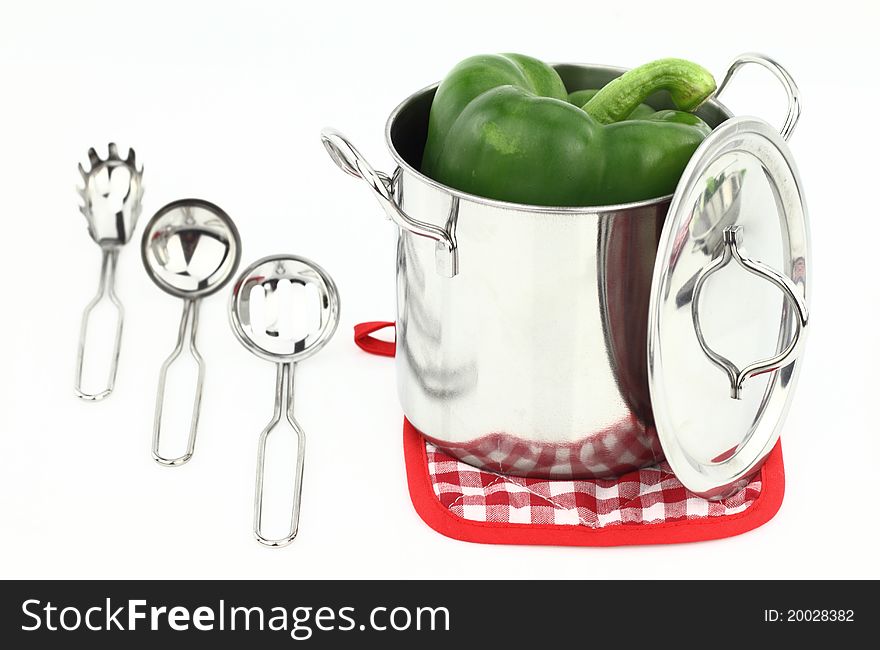 Fresh green pepper inside a pot. Fresh green pepper inside a pot
