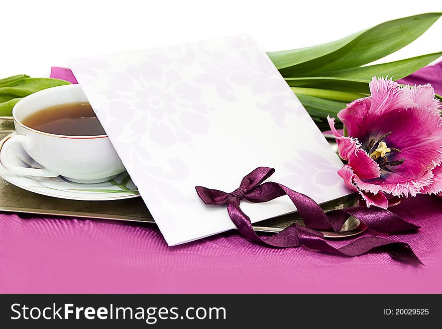 Greeting card with violet tulips and ribbon. Greeting card with violet tulips and ribbon