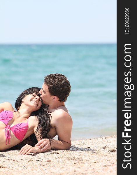 Young loving couple on beach. Young loving couple on beach