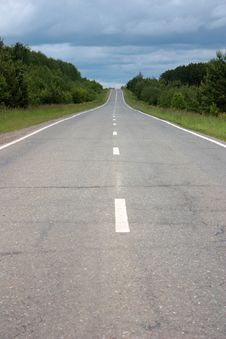 Asphalted Highway Under The Cloudy Sky Stock Photos Asphalted Highway Under The Cloudy Sky Stock Photos