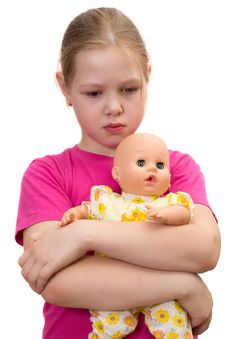 The Beautiful Sad Girl With A Doll Royalty Free Stock Photos
