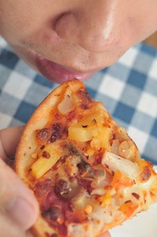Top Down Of Man Eating Pizza Stock Photos