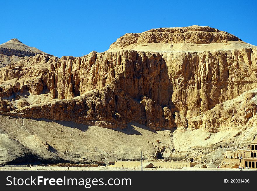 Rocks in Egyptian landscape with blue sky background. Rocks in Egyptian landscape with blue sky background