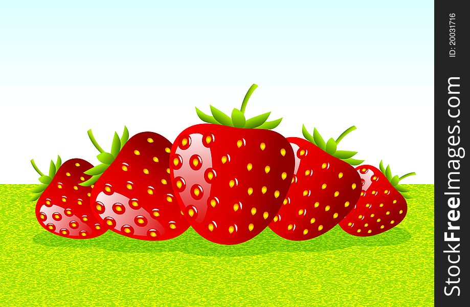 Red strawberries on green background