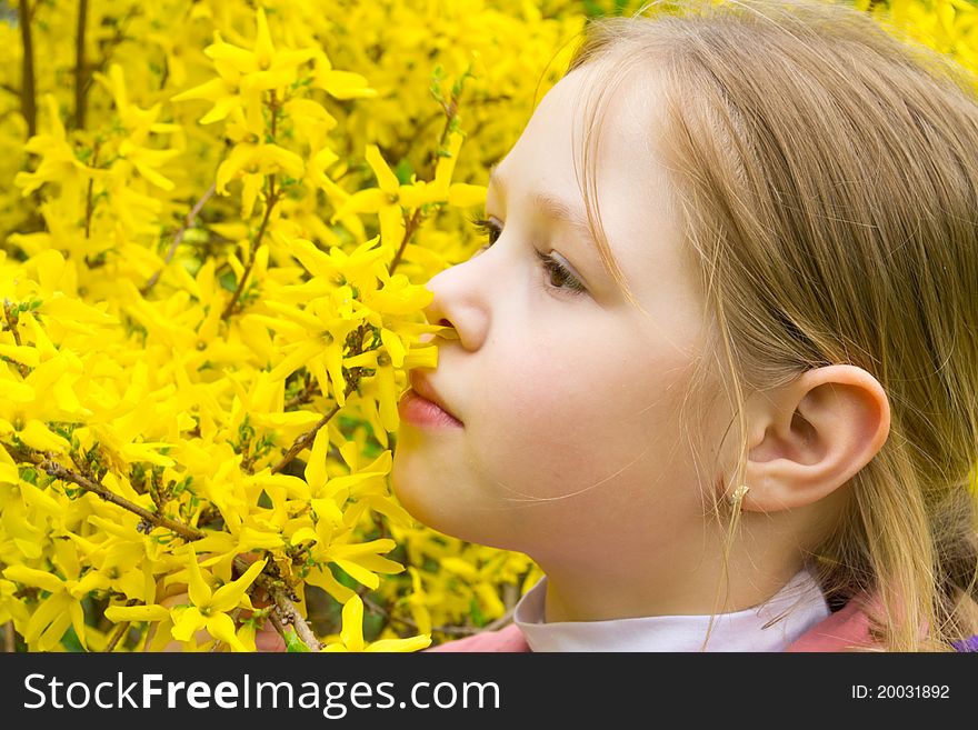 Beautiful girl with yellow flowers