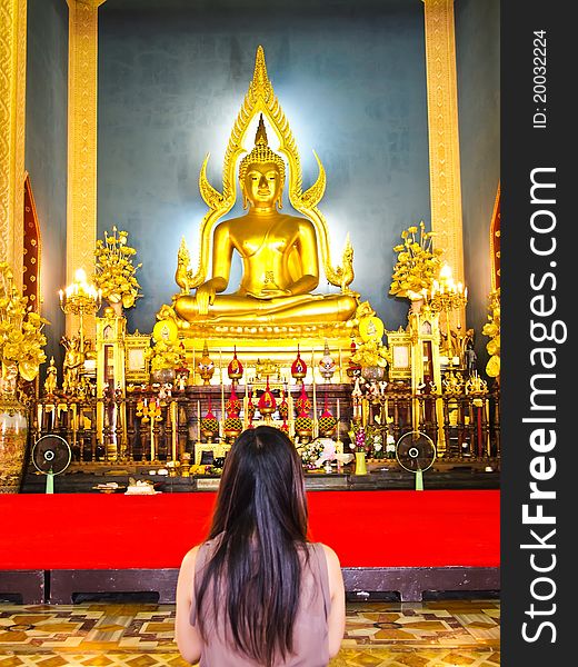 Woman pray The Shinarath buddha in Wat Benjamabopit, Bangkok Thailand. Woman pray The Shinarath buddha in Wat Benjamabopit, Bangkok Thailand