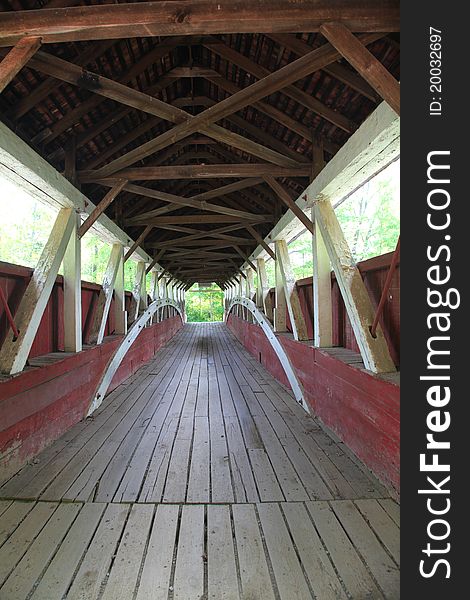 Old covered bridge on rural country road