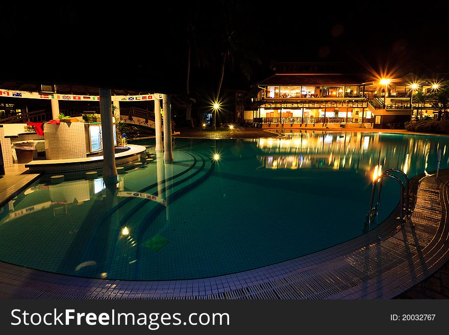 Resort swimming pool at night