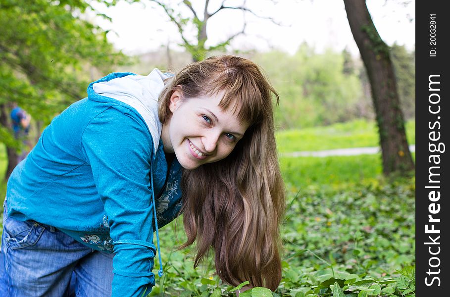 Single beautiful woman relaxing at the park. Single beautiful woman relaxing at the park