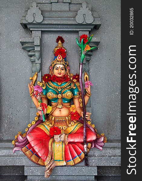 Woman sculpture in a hindu temple in Malaysia