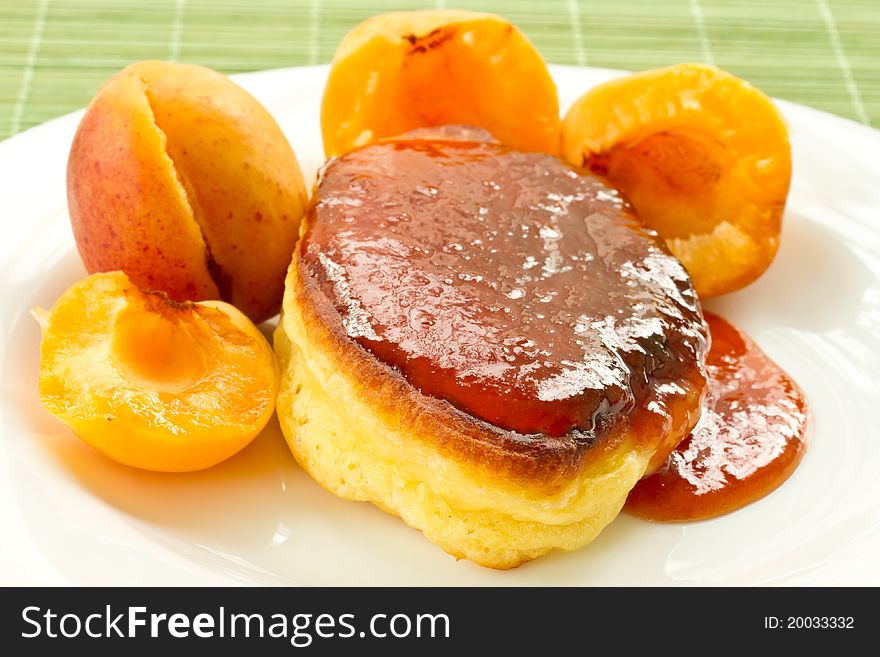 Delicious pancakes with apricot jam