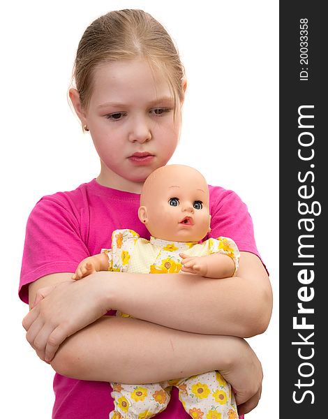 The beautiful sad girl with a doll
