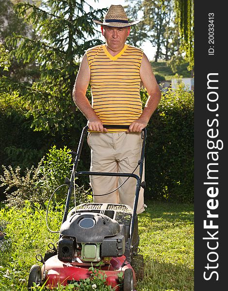 Man Mowing The Lawn