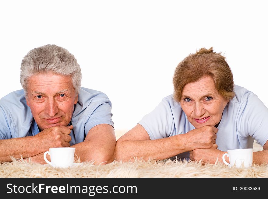 Happy elderly couple on a white background. Happy elderly couple on a white background
