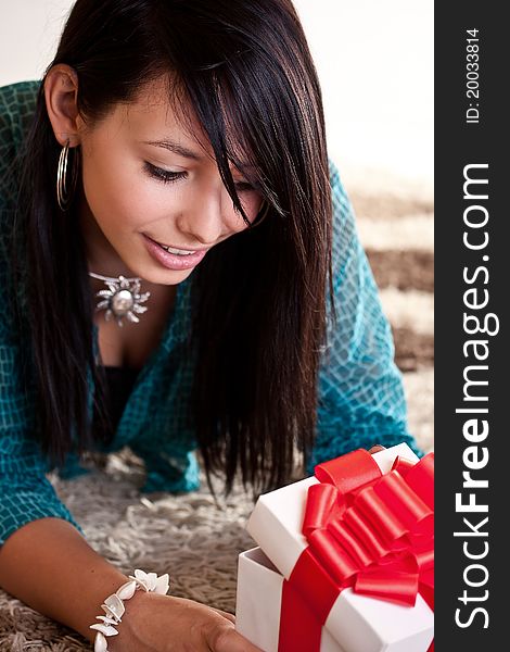 Woman On The Floor With Gift Box