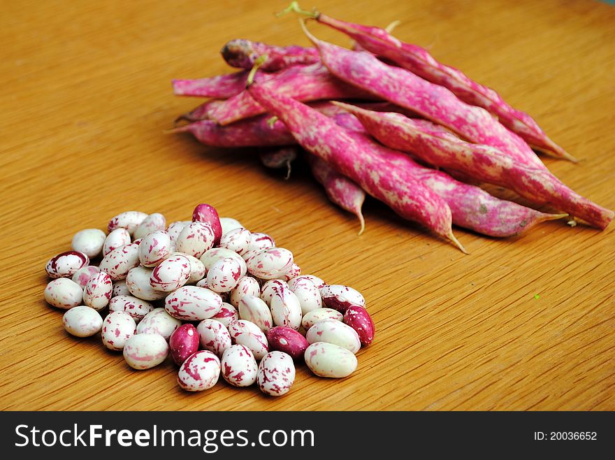 Borlotti beans out of pods and into still closed pods. Borlotti beans out of pods and into still closed pods