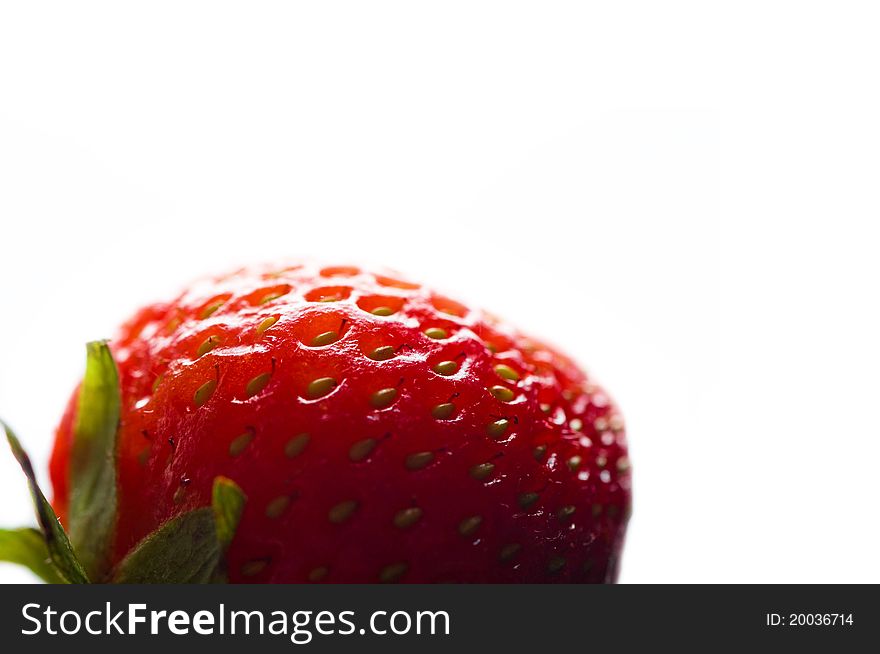 Natural ripe red strawberry over white