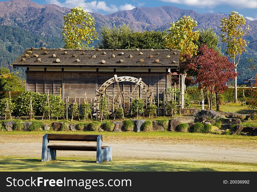 View on the water mill in the park, Toyama prefecture, Japan