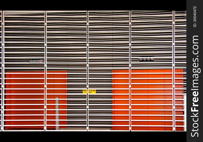 Lines, orange storage doors, security and colour. Lines, orange storage doors, security and colour