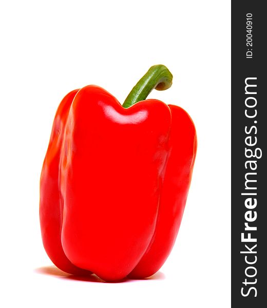 Single red paprika (pepper), isolated on white