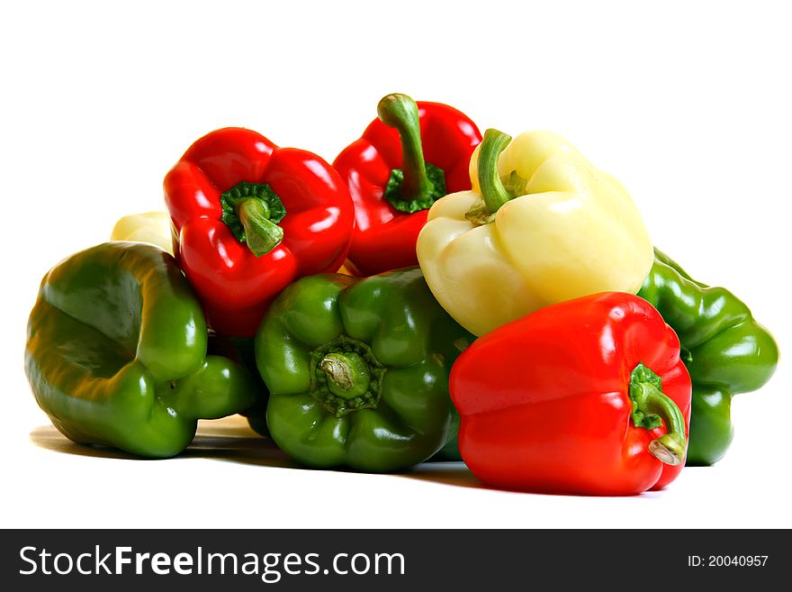 Group of red, yellow and green pepper, isolated on white. Group of red, yellow and green pepper, isolated on white