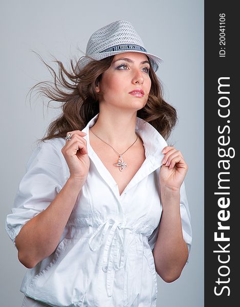 Close-up of beautiful young smiling woman in a hat. Close-up of beautiful young smiling woman in a hat