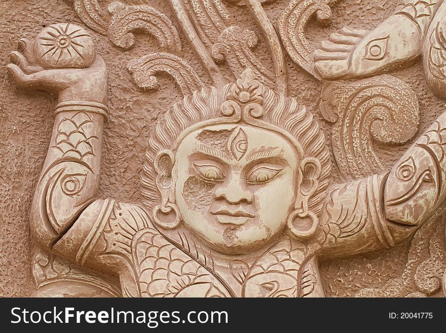 Buddha carved stone. In the temple of Nakhon Sawan.