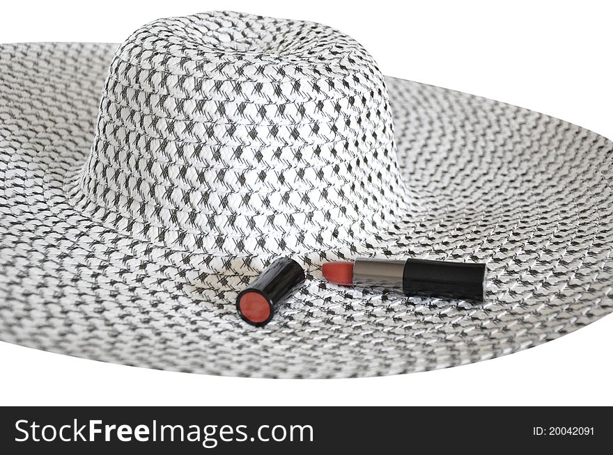 Female summer hat and red lipstick isolated on white. Female summer hat and red lipstick isolated on white