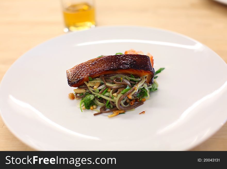 Salmon filled on soba noodles