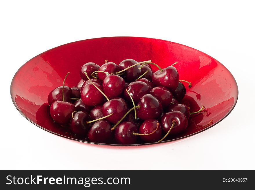 Cherries on a red plate. Cherries on a red plate