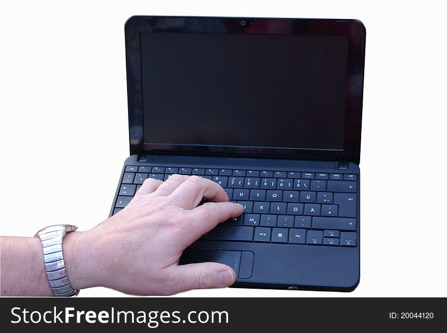 Isolated: Small notebook with black screen space and typing male hand. Isolated: Small notebook with black screen space and typing male hand