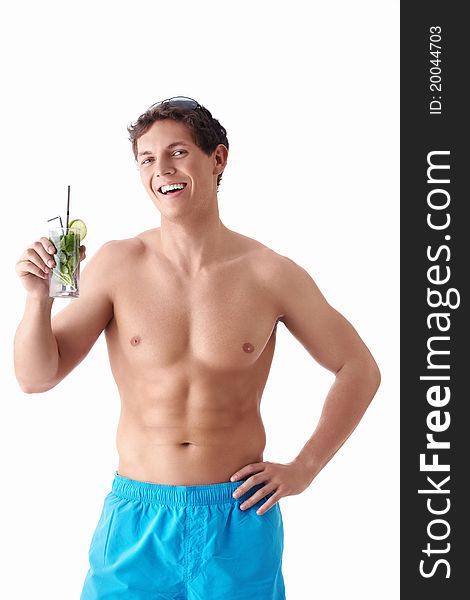 An attractive young man with a mojito on a white background. An attractive young man with a mojito on a white background