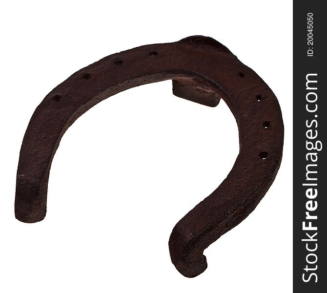 Old rusty horse shoe.