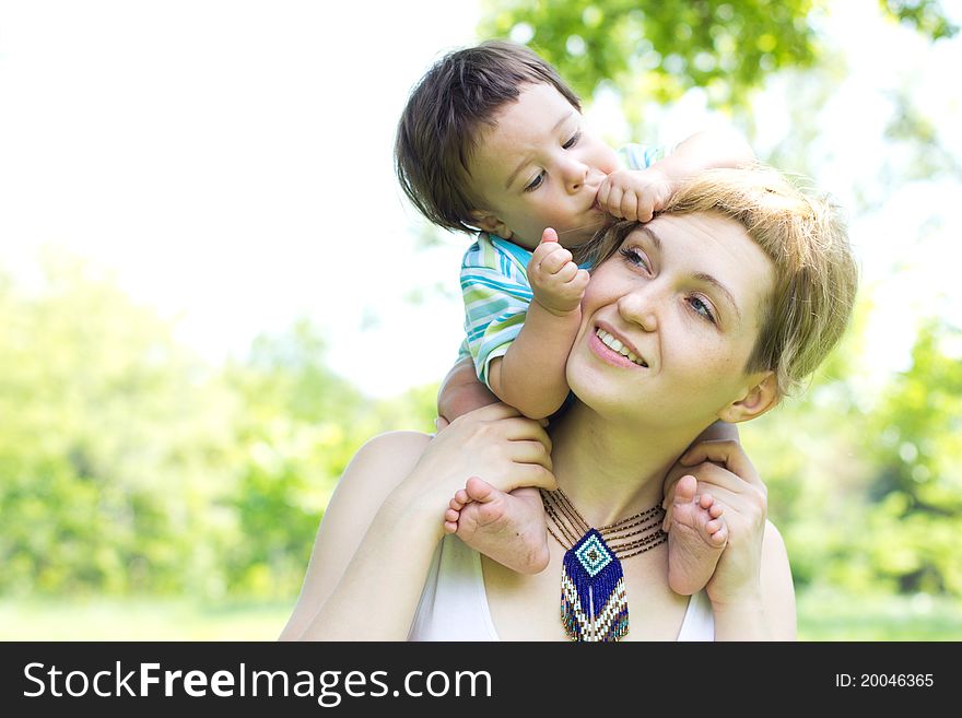 Mother With Son Relaxing Outdoor