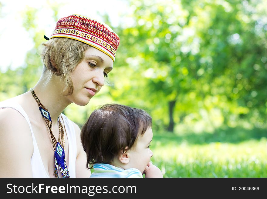 Mother With Son Relaxing Outdoor