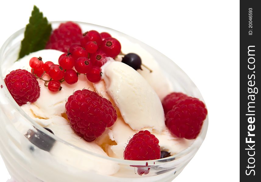 Ice cream with berries over white