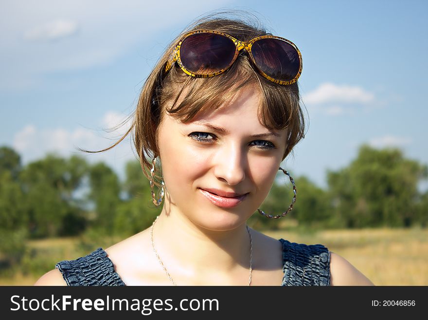 Portrait of a beautiful girl on nature. Portrait of a beautiful girl on nature