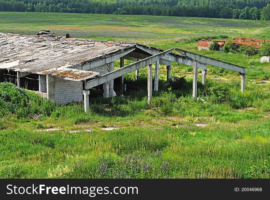 Old abandoned destroyed farm building