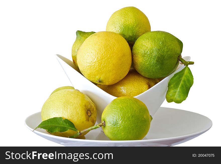 Lemons in a bowl , isolated on a white background