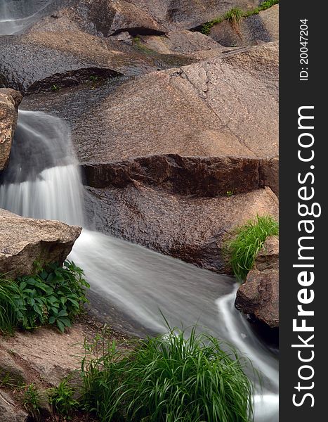 Stream flowing over granite rocks. Stream flowing over granite rocks