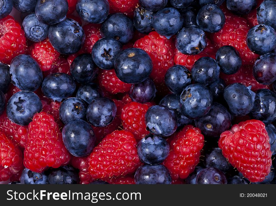 A high resolution of blueberries and raspberries. A high resolution of blueberries and raspberries