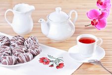 Cup Of Tea, Teapot And Chocolate Iced Spice Cakes Stock Photo Cup Of Tea, Teapot And Chocolate Iced Spice Cakes Stock Photo