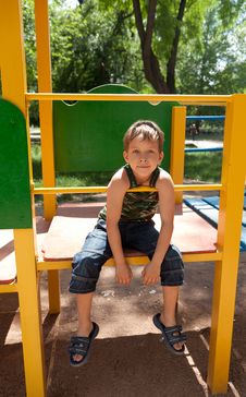 Cute Young Boy On Playground Royalty Free Stock Images