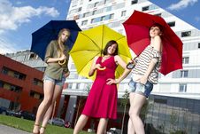 Pretty Young Girls With Umbrellas Stock Image