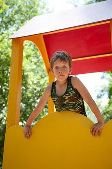 Cute Young Boy On Playground Royalty Free Stock Photos