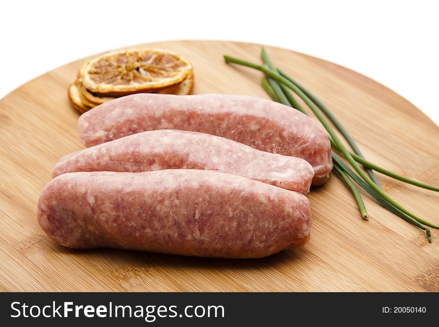 Coarse fried sausage with chives and lemon